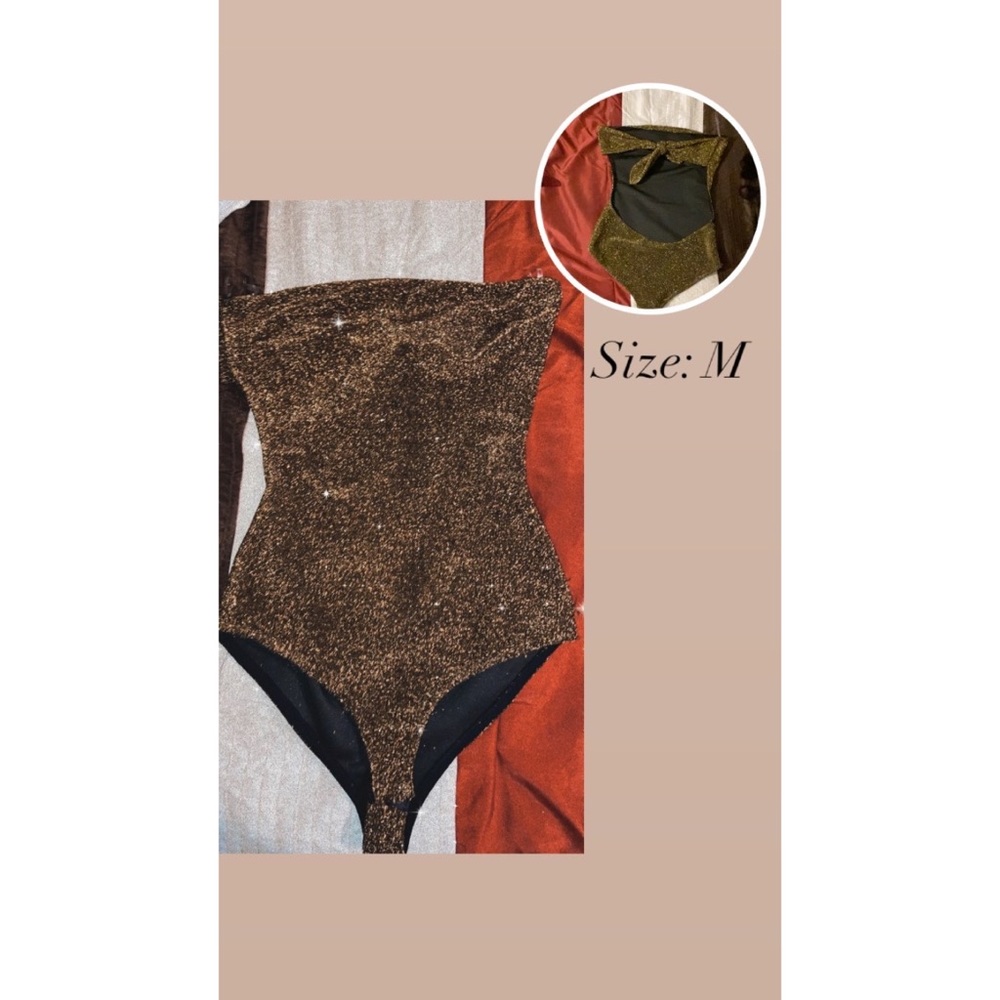 Gold and black glittery body suit
